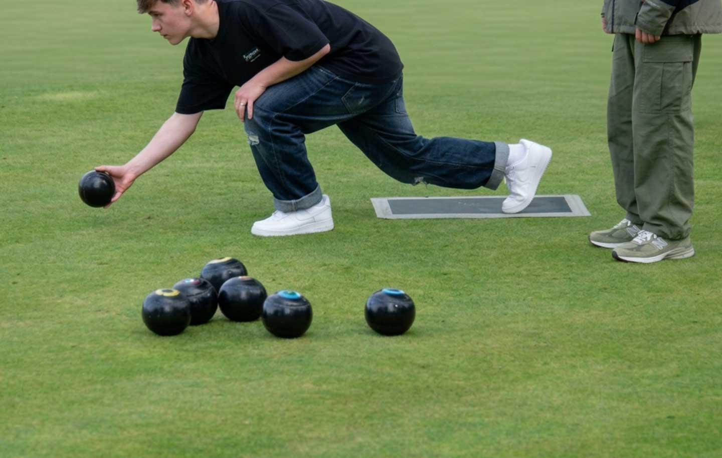 Teenagers taking part in an indoor bowls session