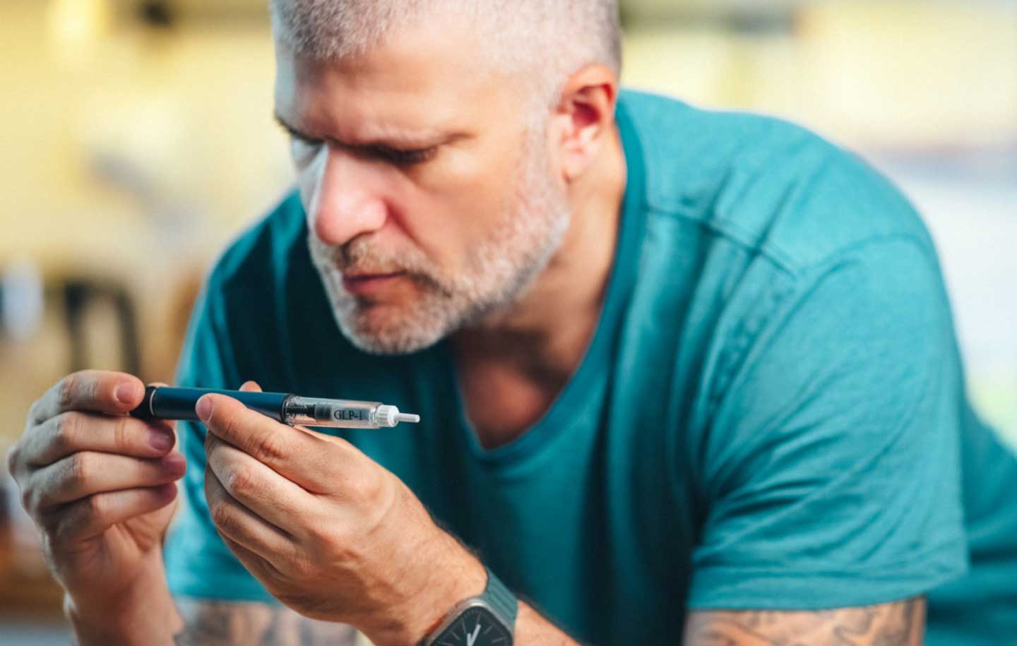 Man Self Injecting Peptide or GLP-1 Weight Loss Medication